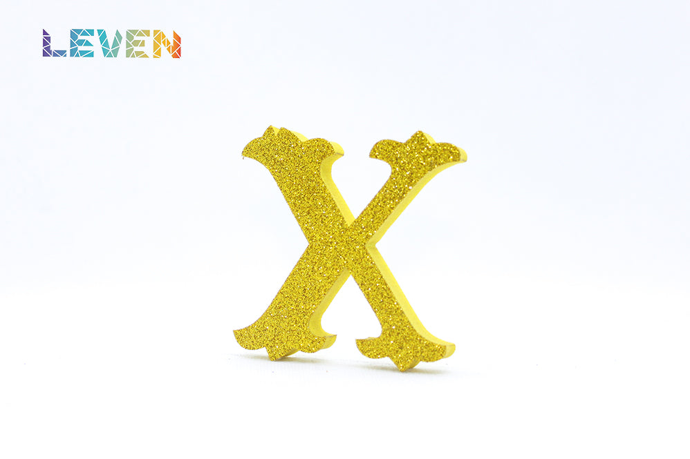 Letras decorativas 7cm Oro purpurina X