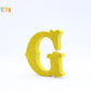 Letras decorativas 7cm Oro purpurina G